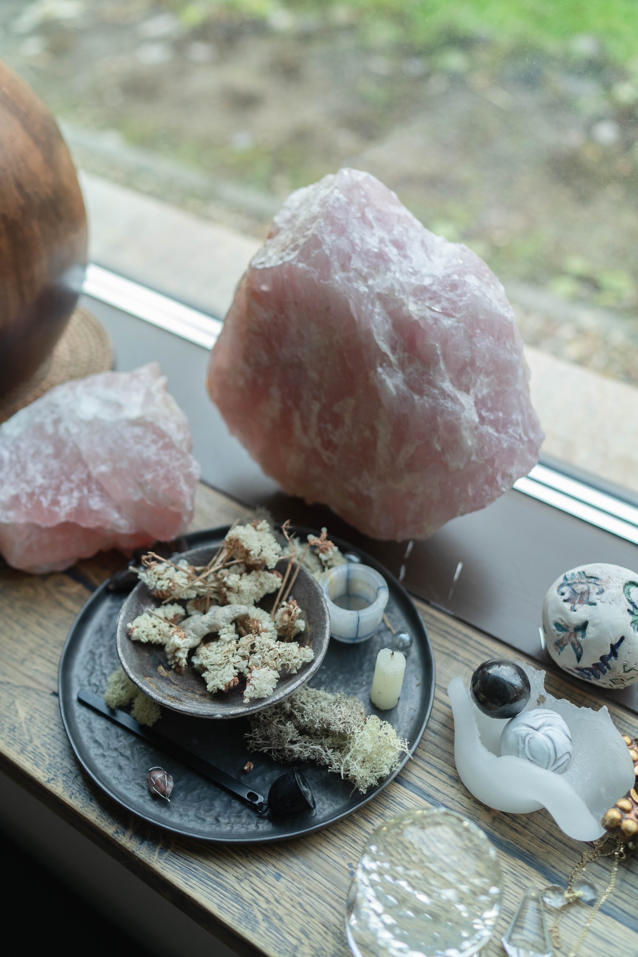 thyme and crystals on a table