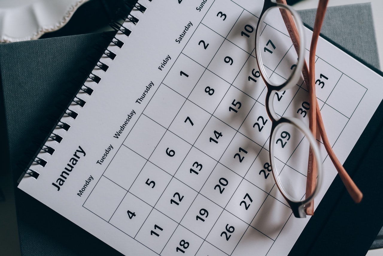 a calendar and glasses