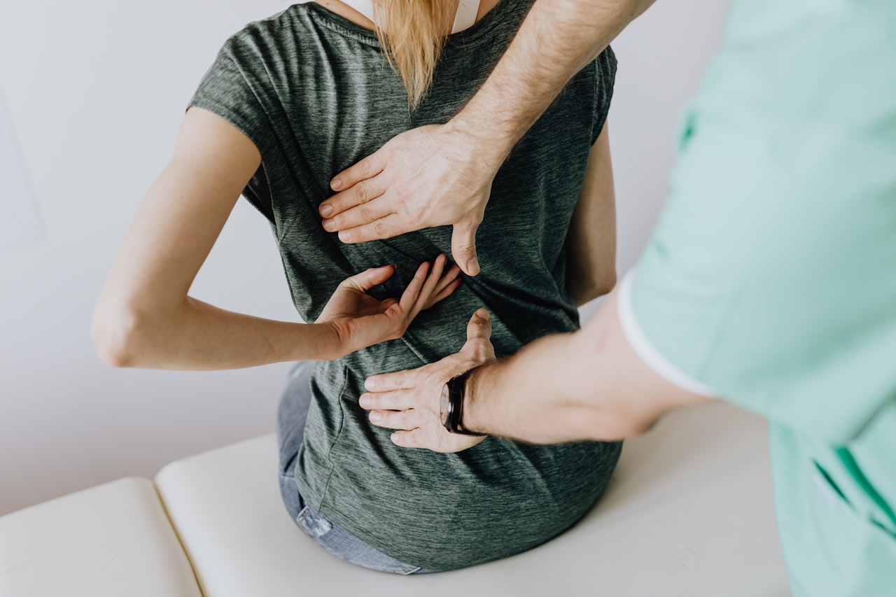 woman's back getting treated