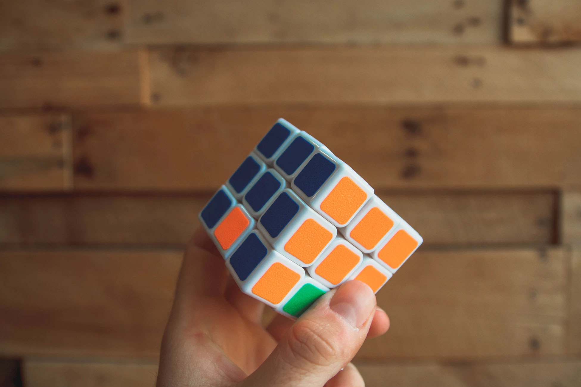 Unfinished Rubik's cube in a hand