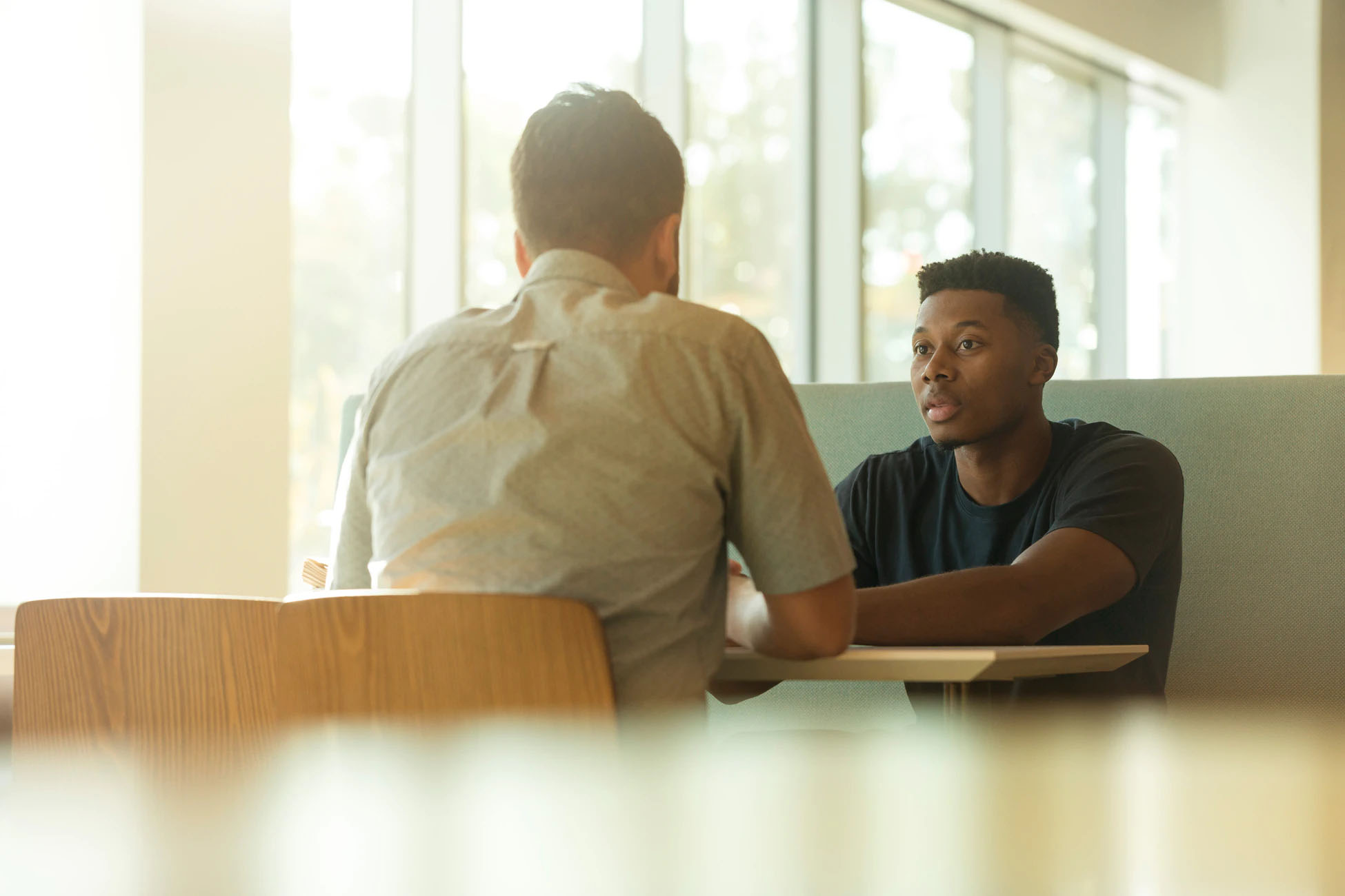 Psychologist talking to a patient