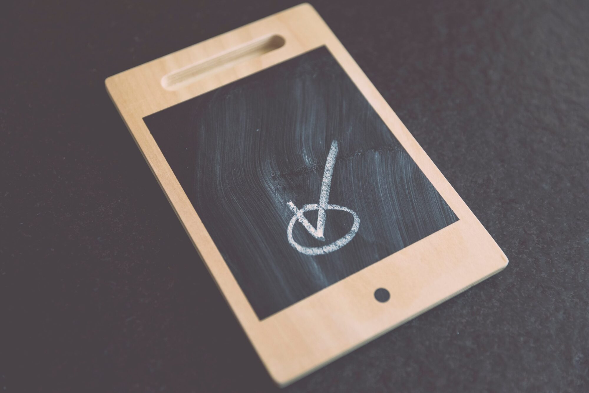 Image of smartphone drawing on blackboard