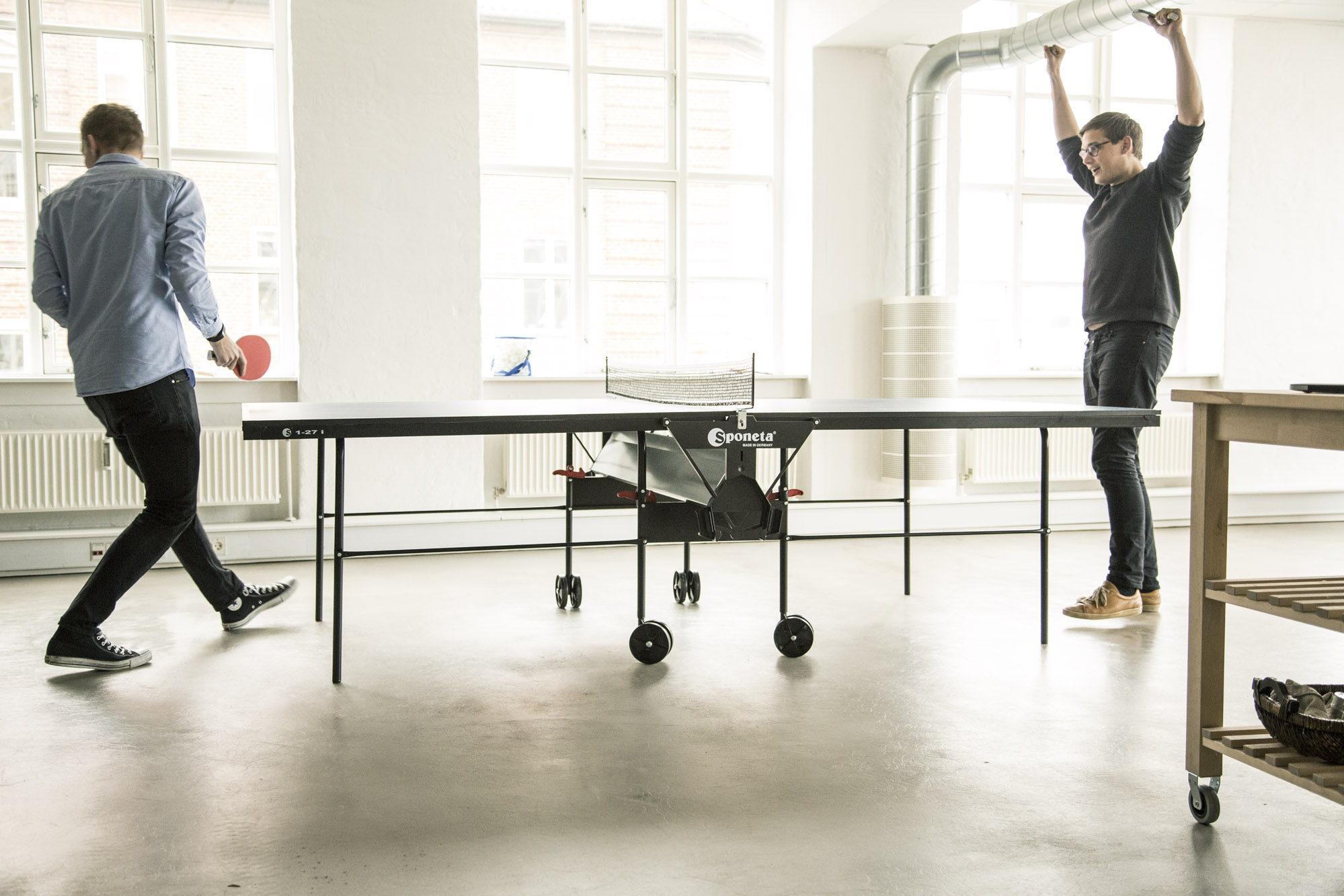 EasyPractice team members playing table tennis