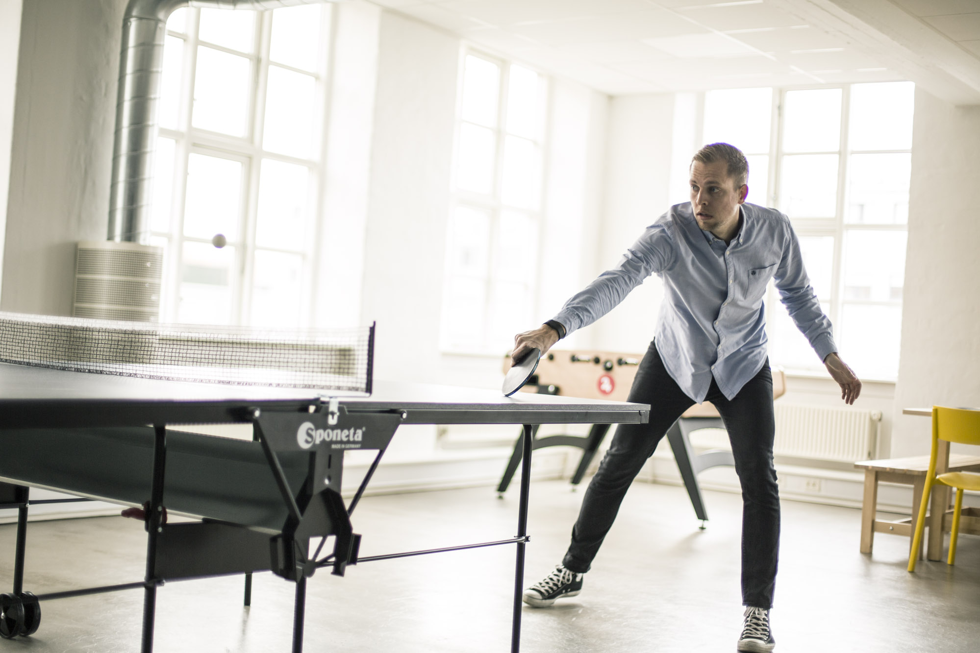 A person playing ping pong