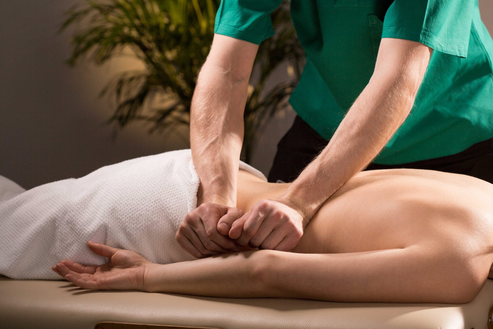 Close-up of physical therapist doing medical massage