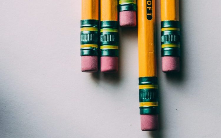a few pencils with erasers
