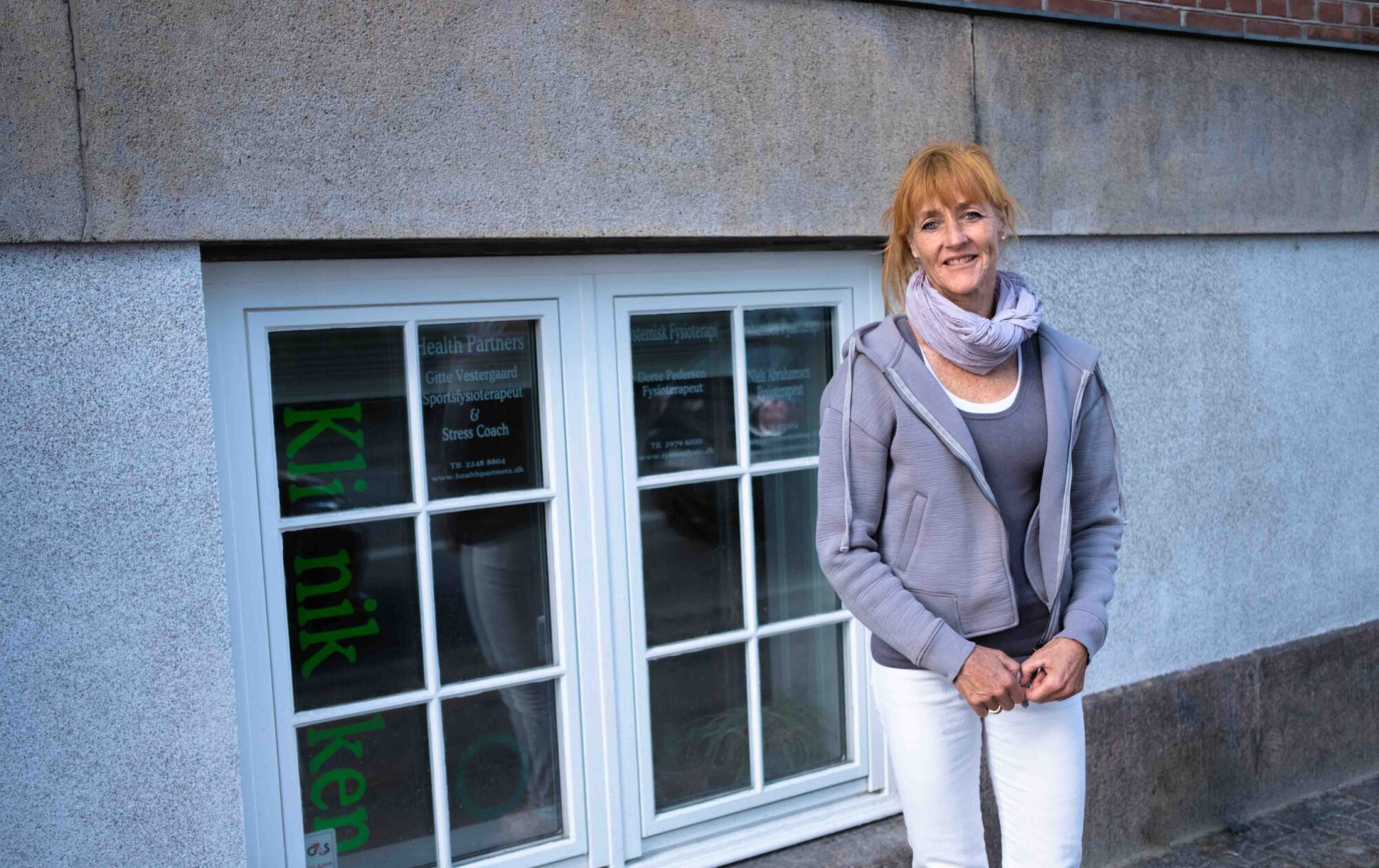 Clinic owner and therapist Hilde Sylstad standing in her treatment room