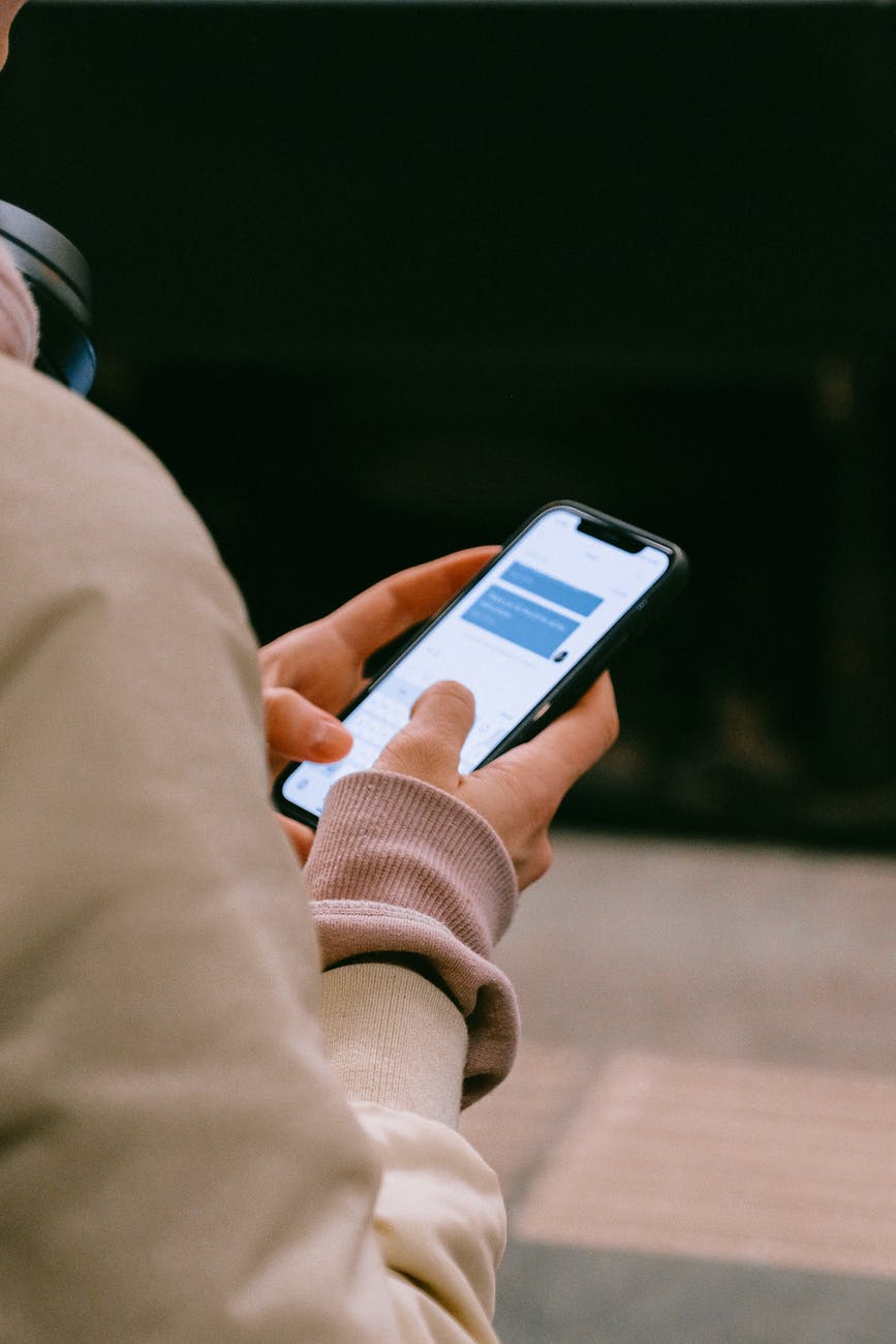 A woman reading a text message