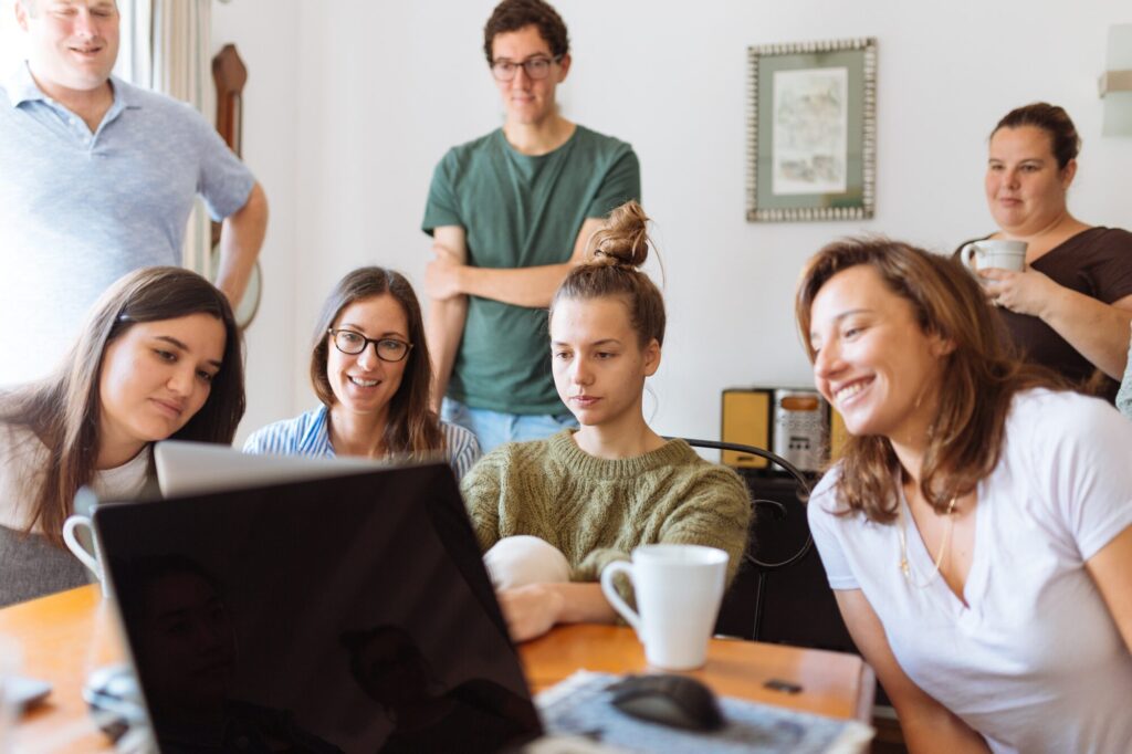 People watching a webinar on a laptop