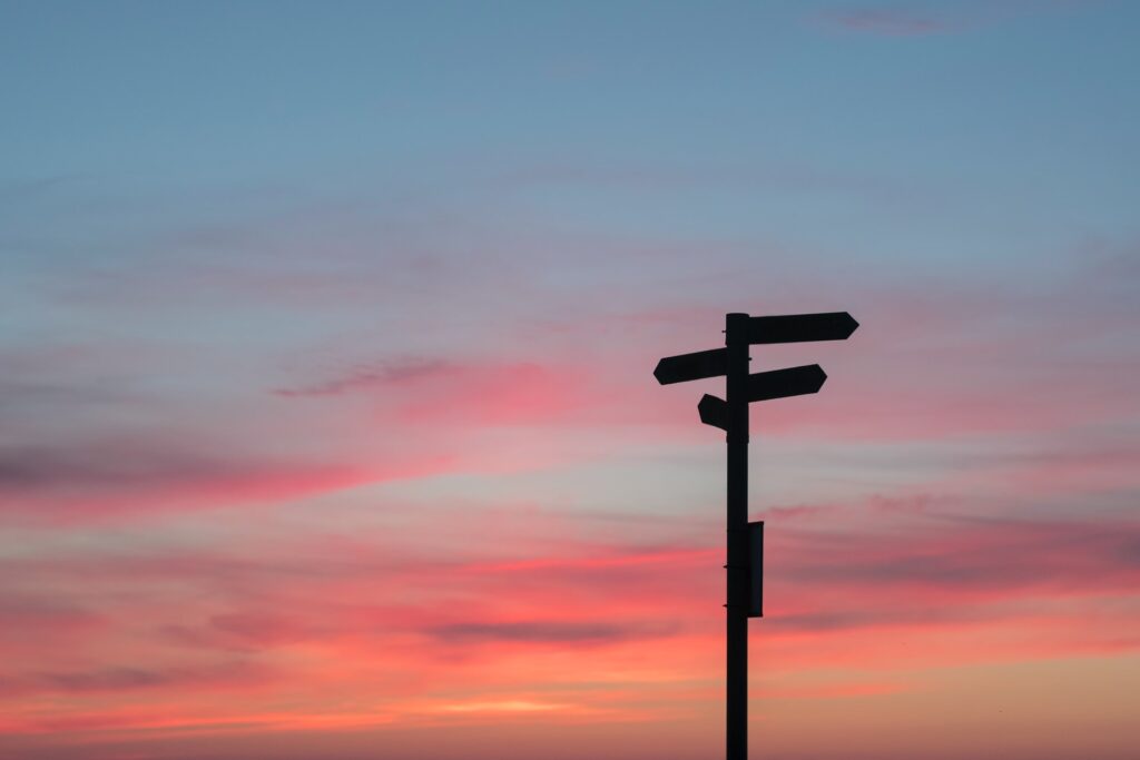 Silhouette of a road sign in the evening